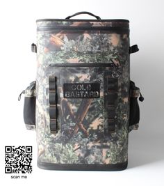 the back side of a camo cooler bag with an image of trees on it