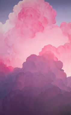 an image of clouds in the sky with pink and purple hues on it's side