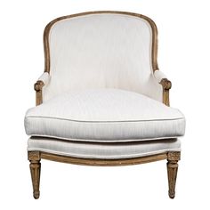 an old fashioned chair with white upholstered fabric