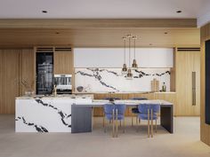 a kitchen with marble counter tops and blue chairs