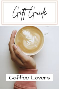 a person holding a cup of coffee with the words gift guide on top and below it