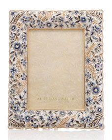 a blue and white flowered frame with an ornate border around the edges, on a white background