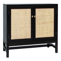 a black cabinet with two doors and wicker panels on the front, against a white background