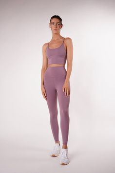 Top and bottom sold separately Buttery soft activewear set in subtle purple color tone. Comfortable and stretchy fabric, with a light/medium support. Whether it's leg day at the gym or heading to a yoga and barre class, these will be your go-to workout set. Buttery soft fabric High stretch and body-shaping Slim fit Removable bra pads included Tailor to your size with the adjustable criss cross strings Great for yoga but also a cute and sexy going out top Fabric 81% Nylon, 19% Spandex Anti-pillin Purple Workout Set, Active Wear Sets, Leg Day At The Gym, Workout Sets Outfit, Toned Legs Workout, 12 Minute Workout, Tone Thighs, Tone Legs, Barre Classes