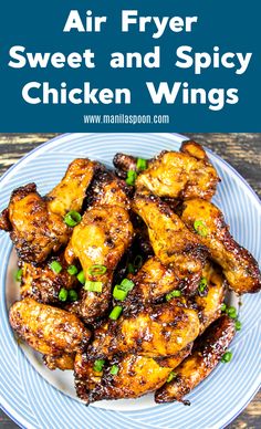 chicken wings on a plate with text overlay that reads air fryer sweet and spicy chicken wings