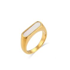 As a true testament to elegance and beauty, the Anela Mother of Pearl Ring is a timeless piece for any wardrobe. The mother of pearl stone captures the light for a statement look, making it perfect for any occasion. Make a sophisticated statement with this stunning piece. Stainless Steel 18K Gold PVD Plated - Made to last! Hypoallergenic, Tarnish free Luxury White Moonstone Promise Ring, Luxury Mother Of Pearl Rings For Wedding, Elegant White Mother Of Pearl Ring, Luxury Mother Of Pearl Wedding Ring, Elegant White Signet Ring For Formal Occasions, Elegant White Signet Ring With Polished Finish, Modern White Open Signet Ring, Elegant Rectangular Gemstone Signet Ring, Elegant Gold Moonstone Ring With Polished Finish