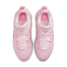 Nike proudly presents their newest release from the KD 15 collection, the Aunt Pearl EP Pink edition. Built for performance and style, this sneaker pays tribute to one of the most enduring influences in Kevin Durant’s life - his late Aunt Pearl. Featuring a combination of mesh, suede, ribbed TPU materials, and a floral print atop the upper, these kicks stand out. The crushed velvet tongues feature special KD patches while ‘Aunt Pearl’ writing adorns the right pull tab- a charming reminder of her bond with her nephew. Quality is found within every element as seen with full-length Cushlon midsoles and visible Air Zoom Strobel units which ensure comfort and support during each step and jump. Own your own pair today to combine exclusive design, enough cushioning for all occasions, all while ho Basketball Shoes Aesthetic, Colorful Volleyball Shoes, Cute Volleyball Shoes, Cool Basketball Shoes, Basketball Shoes Women's, Nike Kd 15, Pink Basketball Shoes, Best Volleyball Shoes, Girls Basketball Shoes