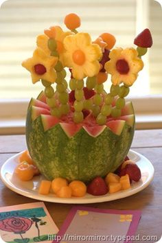 there are fruits and flowers in the shape of watermelon