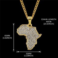 MIANIK African iced out map necklace. 18k gold plated rhinestone necklace. Crystal, diamond unisex stylependant size- 1.5” material- 18kt plated copper base. Almaas means “diamond” Streetwear Bling Necklace With Cubic Zirconia, Streetwear Cubic Zirconia Necklace With Bling, Iced Out Diamond Necklace For Streetwear, Streetwear Diamond Necklace With Bling, Gold Cuban Link Crystal Chain Necklace, Gold Crystal Cuban Link Chain Necklace, Gold Cuban Link Chain Necklace With Crystals, Iced Out Pendant Necklace For Streetwear, Streetwear Iced Out Pendant Necklace