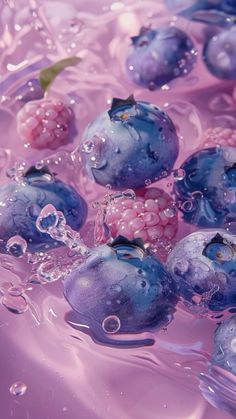 blueberries are floating in water with bubbles