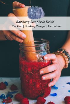 raspberry rose shrub drink in a mason jar