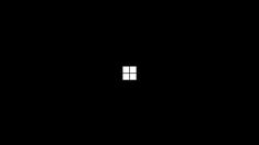 an open window in the middle of a dark room