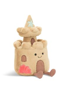 a stuffed toy with a sandcastle on top