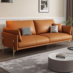 an orange leather couch in a living room