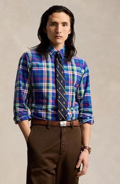 A bright, colorful plaid brings a classic prepster spirit to a shirt that's tailored from cotton oxford cloth and styled to look great whether you wear it tucked or untucked. 46" chest (size Medium) Front button closure Button-down collar Long sleeves with button cuffs 100% cotton Dry clean Imported Classic Multicolor Shirt For Fall, Classic Multicolor Fall Shirt, Plaid Cotton Preppy Shirt, Preppy Plaid Cotton Shirt, Preppy Plaid Collared Shirt, Multicolor Collared Cotton Flannel Shirt, Preppy Cotton Shirt, Fitted Plaid Preppy Shirt, Preppy Plaid Button-up Shirt