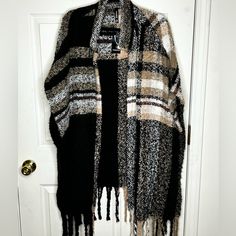 Black With Plaid Design. Fringe Bottom. One Size Fits All. New With Tags. Torrid Plus-Size! Cozy Black Shawl Outerwear, Cozy Black Cape Outerwear, Casual Black Shawl Outerwear, Black Shawl Outerwear For Fall, Fringed Poncho, Plaid Design, Black Tan, Black And Tan, One Size Fits All