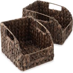 two brown woven baskets sitting next to each other