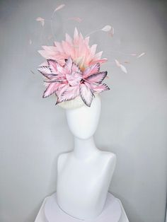 From the 2024 Featured Milliner of the Kentucky Derby Museum  Gorgeous Kentucky Derby hat fascinator  kentucky derby hat fascinator white sinamay with large pink blush gray silver flowers with light peach pink blush feathers headband attachment each hat is totally one of a kind! no two are alike! I can probably add feathers, flowers etc to existing hats for a small fee. I cannot remove anything from existing hats. Just message me and see if we can make it work! :) I cannot make custom order from Pink Ostrich Feather Fascinator For Royal Ascot, Blush Fascinator For Kentucky Derby, Pink Feathered Headpiece For Kentucky Derby, Derby Hats Fascinators, Hat Fascinator, Feather Headband, Kentucky Derby Hat, Derby Hat, Light Peach