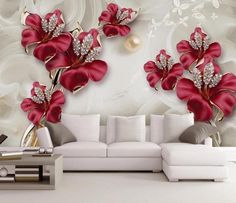 the living room wall is decorated with red flowers and pearls on it's side