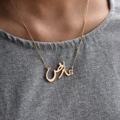 "Personalized Urdu name necklace crafted in 14k solid gold with a dainty cable chain, this makes a unique customized gift for one and all. * Gold: 14k Solid Gold * Gold Colour: Yellow / Rose / White * Gemstone: Natural Genuine Diamond * Chain Length: 15-18\" cable chain P.S. The design will be finalized with you through sketches before starting manufacturing. * Authenticity Check: This necklace will be marked for gold PLEASE NOTE: - White gold CONTAINS NICKEL. - Yellow and Rose Gold NICKEL FREE. Turkish Gold Jewelry, Arabic Name Necklace, Name Chain, Hamper Ideas, Gold Pendent, Sarees For Girls, Diamond Tiara, Eid Gift, Diamond Crown