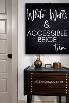 a black and white sign that says white walls and accessible begin trim