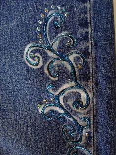 the back side of a pair of jeans with sequins