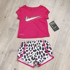 New Nike 2 Piece Outfit Set Pink Short Sleeve Top Paired With Matching Shorts Size 2t Red Sports Sets For Spring, Nike Summer Playwear Sets, Playful Nike Playwear Sets, Nike Tech Suit, Traveling Clothes, Air Jordans Girls, Nike Onesie, 2 Piece Outfit Set, Nike Sweatsuit