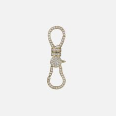 The Lionheart Jewelry Diamond Dog Clip and Swivel Connector is hand-crafted in 14k Yellow Gold and encrusted with diamonds. Add this to any chain and suspend your favorite charms from it - the options are endless! 14k Yellow Gold Diamonds: 0.70 TCW (total carat weight) Dog Clip, 0.35" (9mm) x 1.2" (30mm) Made in Italy Diamond Dogs, Dog Clip, Jewelry Diamond, Timeless Jewelry, Diamond Jewelry, Gold Diamond, Hand Crafted, In Italy, Charms