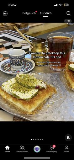 an image of food on a plate with coffee and tea in front of the screen