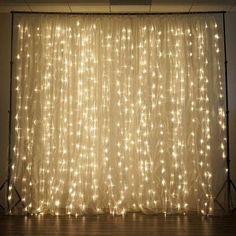 the curtain is covered with white lights