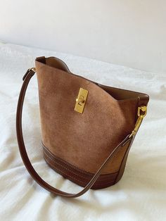 2023 New style. Simple leather bucket bag. Material: PU Leather Size: 8.2"H x 7.8"W x 5.1"D Designer Style ID: 8565 Chic Bucket Leather Bag with Shoulder Strap and Inner Pouch, Women's Everyday Handbag Brown Bucket Hobo Bag For Daily Use, Brown Bucket Bag For Everyday Use, Chic Fall Bucket Shoulder Bag, Brown Bucket Satchel With Large Capacity, Brown Bucket Shape Satchel For Daily Use, Brown Large Capacity Bucket Satchel, Brown Large Capacity Bucket Bag, Trendy Brown Bucket Bag, Daily Use Bucket Bag With Snap Closure