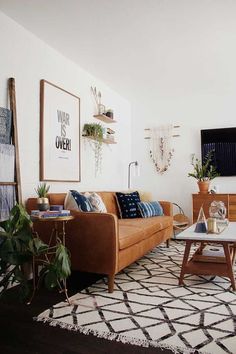 a living room filled with furniture and decor