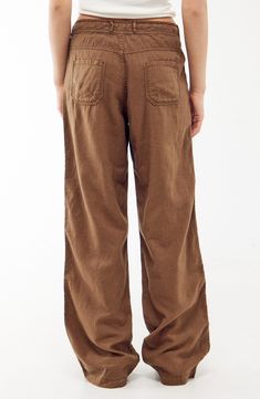 Stay cool and comfortable throughout the warmer seasons in these crisp linen-blend pants fixed with a drawstring waist. 31" inseam; 21" leg opening; 10 1/2" front rise; 13" back rise (size Medium) Exclusive retailer Zip fly Drawstring waist Front slant-patch pockets; coin pocket; back pockets 55% linen, 45% cotton Machine wash, line dry Imported Teacher Fits, Genderless Fashion, Bdg Urban Outfitters, Linen Blend Pants, Rollerball Perfume, Brown Pants, Fragrance Design, Fabric Gift Bags, Fit Check