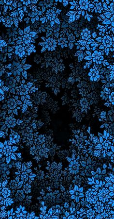 an image of blue flowers on black background