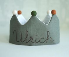 Linen color- L18. Thread color- 14. The Linen Embroidery Kids Crown is a beautifully handcrafted birthday crown, perfect for celebrating your little one's special day. This personalized crown is designed for babies, toddlers, and older children, adding a touch of magic to their playful moments and creating lasting memories. Ideal as a unique kids' birthday gift, for birthday parties, photoshoots, or everyday playtime, it captures the essence of a joyful, magical childhood. If you would like to s Personalized Crown, Baby Birthday Crown, Magical Childhood, Linen Embroidery, Birthday Crown, Linen Color, Unique Kids, 1st Birthday Party, Gift For Birthday