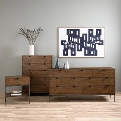 a living room scene with focus on the dresser and sideboard in the foreground