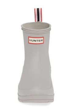 This lightweight version of a classic Hunter rain boot retains all the style and waterproof practicality of the original, in a streamlined, updated silhouette. 1 1/2" heel; 3/4" platform (size 9) 6" shaft Pull-on style Removable insole In hot or humid weather, natural latex rubber releases a protective wax film; simply wipe it off with a damp cloth A pristine finish and shine is easily restored with regular use of Hunter Boot Buffer or Instant Boot Shine Natural rubber upper/textile lining/natur Classic Waterproof Rain Boots, Classic Waterproof Rain Boots For Rainy Weather, Hunter Boot, Shoes Illustration, Humid Weather, Hunter Rain Boots, Gift Kit, Rain Boot, Diy Kits Gift