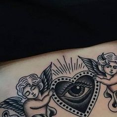 an old school style tattoo with cherubs and heart