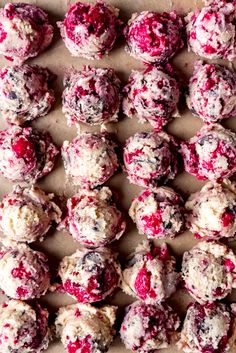 some very tasty looking cookies and muffins with cranberry sauce on them