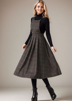 Keep your fashion game strong in our Plaid Wool Midi Dress or the equally stunning Wool Pinafore Dress. Level up your fashion quotient with our Pleated Dress or express your individuality through our Fit and Flare Wool dress. ★★FEATURES * 25% wool, other fiber,nylon * Polyester lining * Two side seam pockets * Right hidden zipper closure * Adjustable strap * Plaid Wool Dress * Wool Pinafore Dress * Fit and flare dress * Perfect for winter, autumn, spring * Dry clean ★★ Bespoke Order Service If you Request other color Request the length Your height is not between 155 cm- 172 cm Your weight is over 75 kg I can do it for you, It will need some extra fee depending on on your need. Contact with me for more detail. ★★ Get your size in Size Chart with your body measurement https://www.etsy.com/li Wool Jumper Dress, Vintage Plaid Dress For Winter, Vintage Plaid Winter Dress, Midi-length Plaid Dress For Fall, Sleeveless Plaid Dress For Work, Plaid Midi Length Dress For Work, Plaid Midi Dress For Fall Workwear, Workwear Midi Length Plaid Dress, Knee-length Fitted Pinafore Dress For Fall