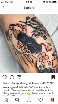 a person with a tattoo on their arm