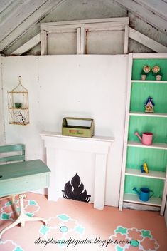 a room with a desk and shelves in it