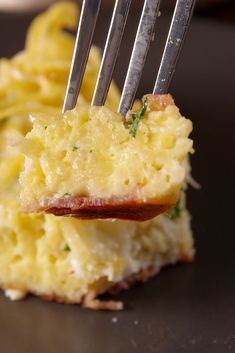 a fork sticking out of a piece of food