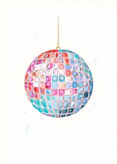 a colorful ornament hanging from a chain on a white background with snowflakes