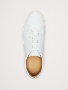 A customer-favorite returns.  We updated the minimalist silhouette of our best-selling sneaker with beautiful Italian leather uppers.  Plus, we added lightweight, durable OrthoLite® performance insoles for breathable cushioning that wicks away moisture for ultimate comfort.  Italian leather uppers.  Rubber soles.  C width. Minimalist Silhouette, The Minimalist, Winter Sale, Wicks, Leather Sneakers, Italian Leather, Leather Upper, Man Shop, Sneakers