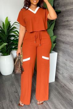 Cotton Pant Set With Short Sleeves, Casual V-neck Sets With Pockets, Casual White Short Sleeve Pant Set, Casual Brown Workwear Sets, White Casual Pant Set For Work, Casual White Pant Set For Work, Orange Short Sleeve Tops With Pockets, Orange Short Sleeve Sets For Spring, Casual Orange Workwear Sets