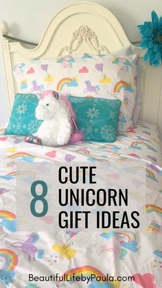 a stuffed animal sitting on top of a bed with text overlay that reads 8 cute unicorn gift ideas