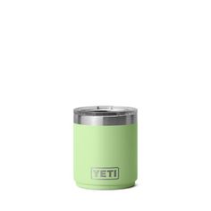 the yeti insulated tumbler is shown in light green with a stainless steel lid