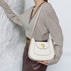 The semicircle design women shoulder bag. The simple and sophisticated design makes it look elegant, easy to wear with clothes, it is sophisticated and classic style. Clamshell sliding metal lock, unique golden lock shape and solid color PU leather bring the layered effect of color collision, so that the layers of the bag more distinct. Good for adding a hint of femininity to your looks, this bag will keep you looking your absolute best no matter the occasion.Weight: 490 gWidth (cm): 7 cmHeight Vintage Canvas Bags, Jewelry Knowledge, Retro Shoulder Bag, Buckle Bag, Buckle Bags, Women Shoulder Bag, Quilted Crossbody Bag, Jewelry Fashion Trends, Jewelry Outfit