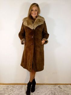 Vintage_Sherpa Sheepskin Coat Penny Lane Coat This is a stunning sheepskin coat, beautifully sewn with bust darts, nicely fitted at the waist. The coat is in perfect condition without wiping stains and other creases. Dimensions: sleeve from the bottom: 45 cm sleeve from the collar: 78 cm chest: 50 cm total length: 108 cm Our model is 173 tall and wear L size. Famous Hippies, Penny Lane Coat, Sheepskin Coat, Winter Mode, Penny Lane, Almost Famous, Hippie Boho, Penny, Sewing